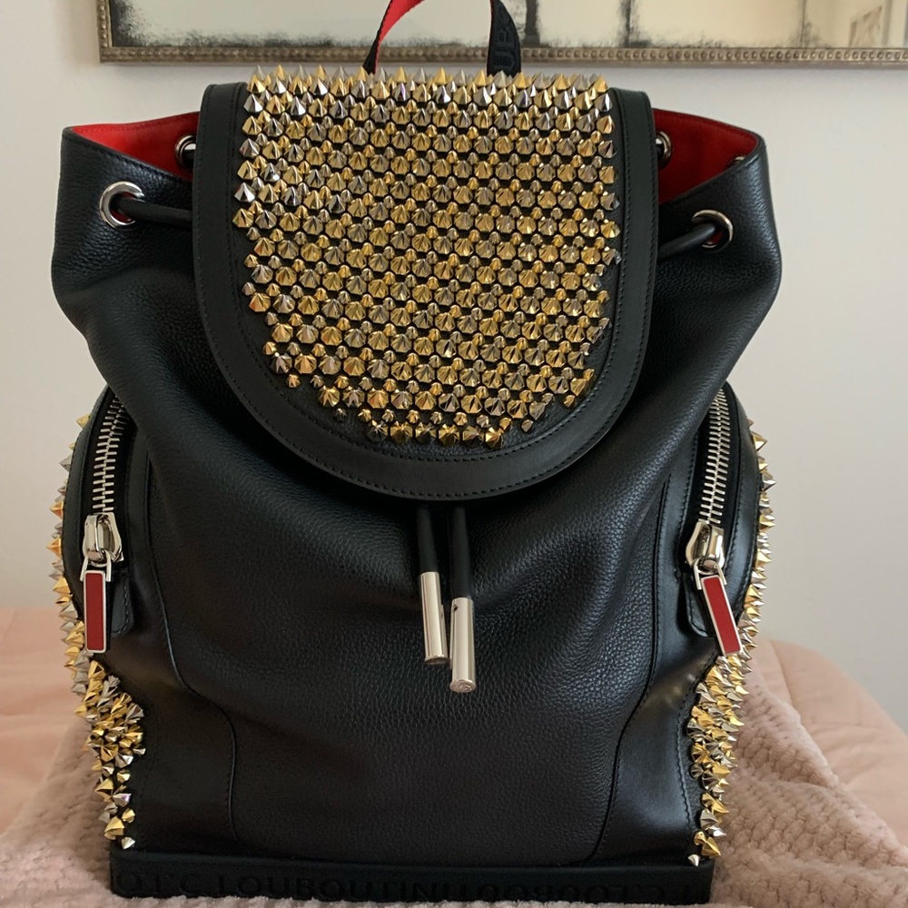 Christian Louboutin Explorafunk gold and silver studs backpack.